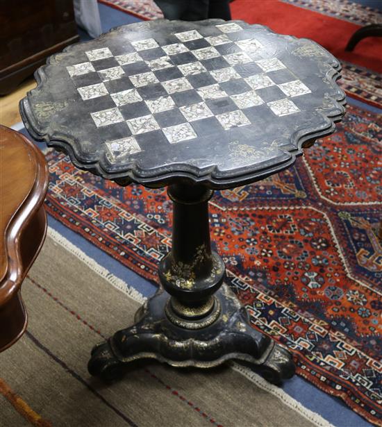 A Victorian papier mache games table, painted and gilded and inlaid with mother of pearl, H 72cm